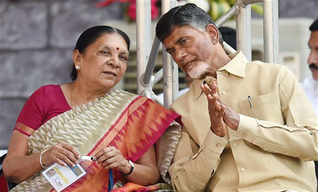 Gujarat CM Anandiben Patel and Andhra Pradesh CM Chandrababu Naidu at the swearing-in ceremony of new Maharashtra government in Mumbai. (Photo: PTI) Gujarat CM Anandiben Patel and Andhra Pradesh CM Chandrababu Naidu at the swearing-in ceremony of new Maharashtra government in Mumbai. (Photo: PTI)